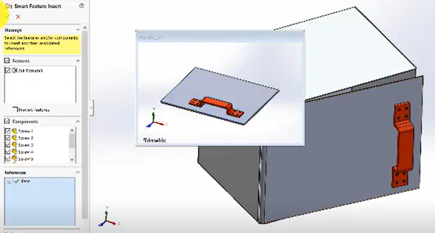 Select the face reference to add the screws to the handle and holes to the door assembly.